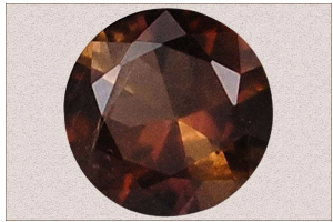 Axinite, a Stone for Relieving Spinal Pain