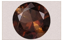 Axinite, a Stone for Relieving Spinal Pain