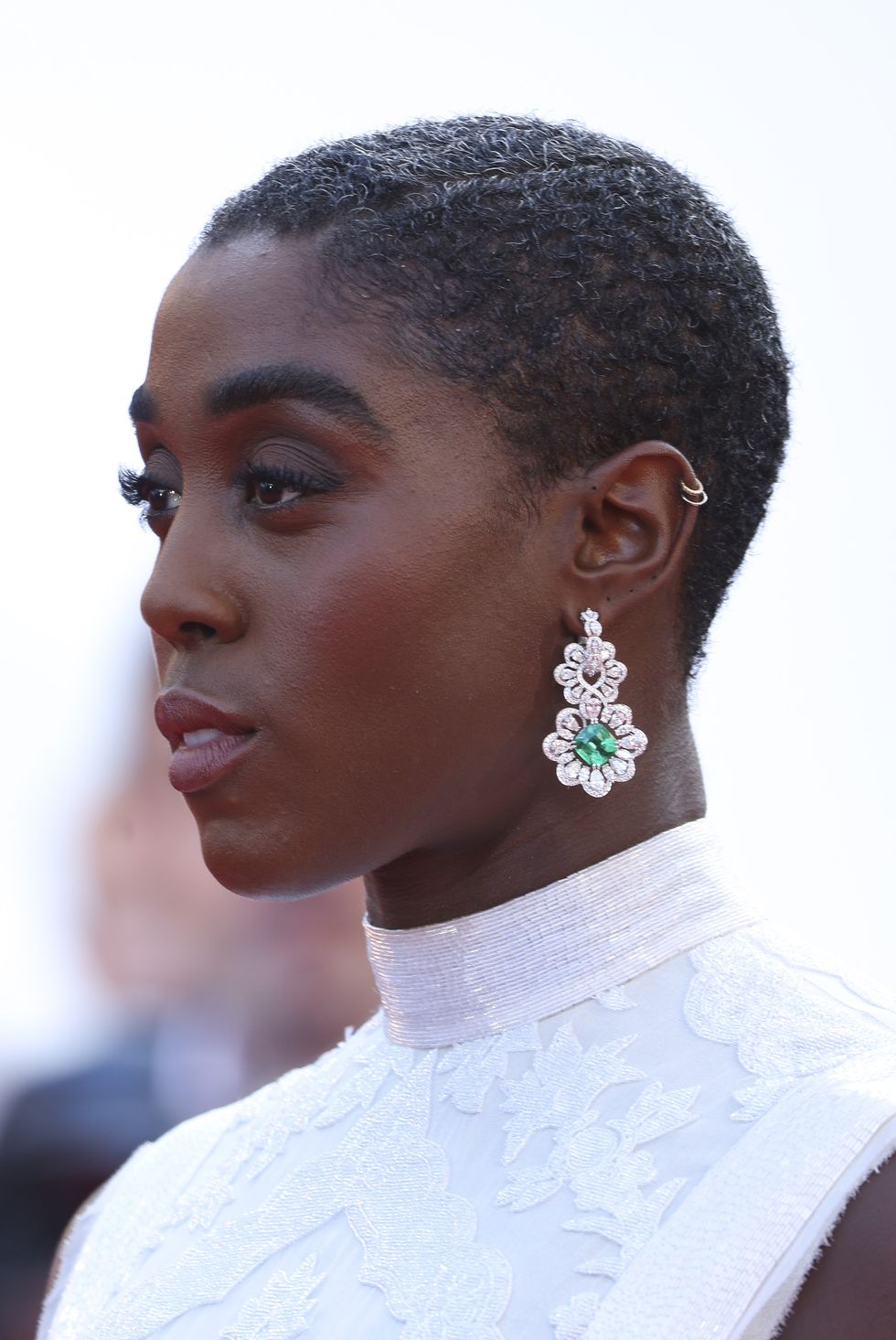 Lashana Lynch in Floral Drop Earrings Consisting Emerald and Diamonds