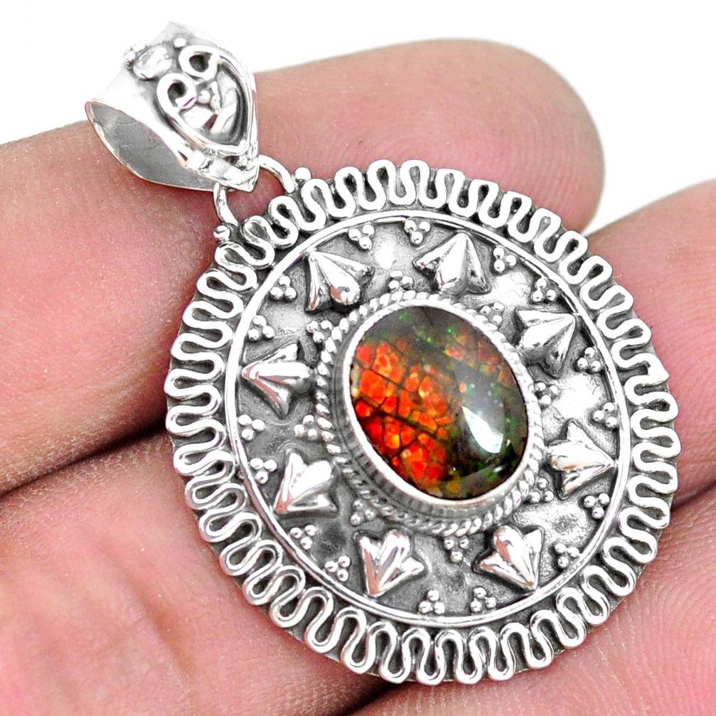 3.91cts natural multi color ammolite (canadian) 925 silver pendant p24822