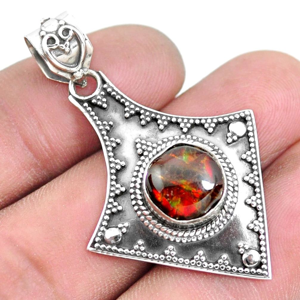 4.92cts natural multi color ammolite (canadian) 925 silver pendant p24837