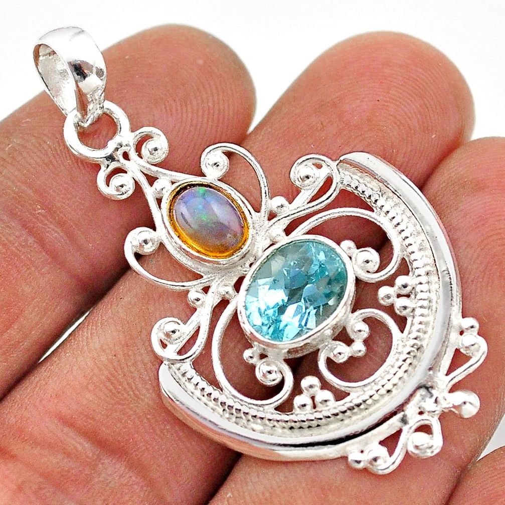 4.53cts natural blue topaz ethiopian opal 925 sterling silver pendant t68576