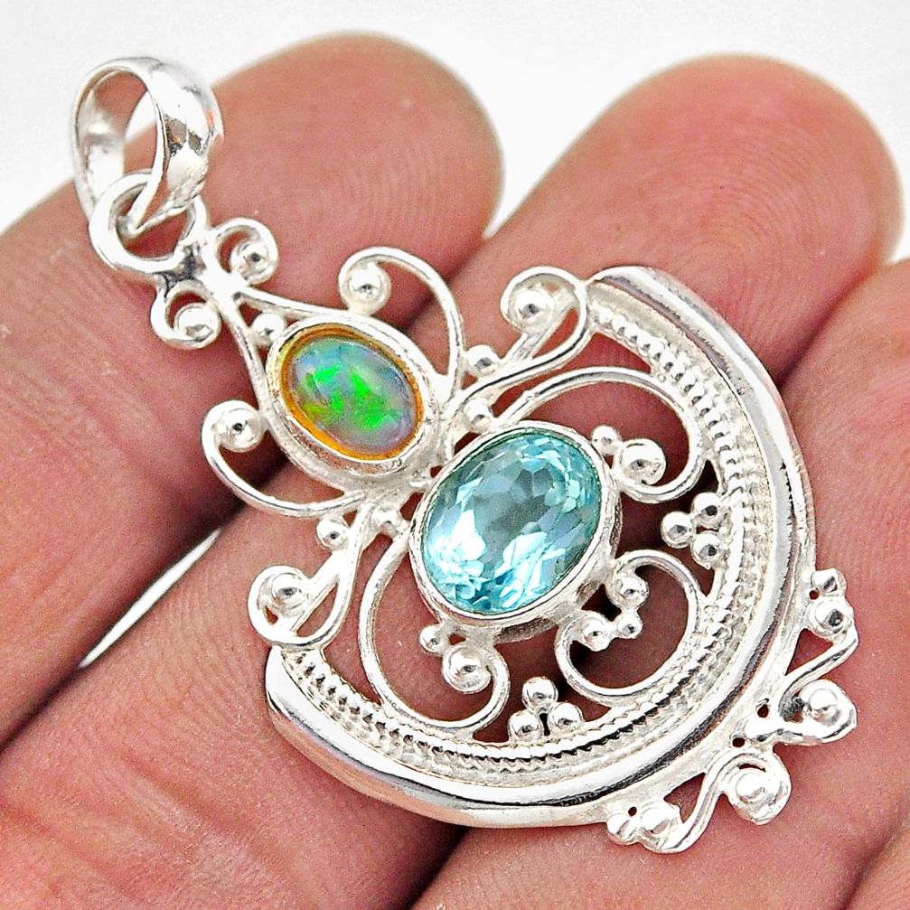 4.31cts natural blue topaz ethiopian opal 925 sterling silver pendant t68578