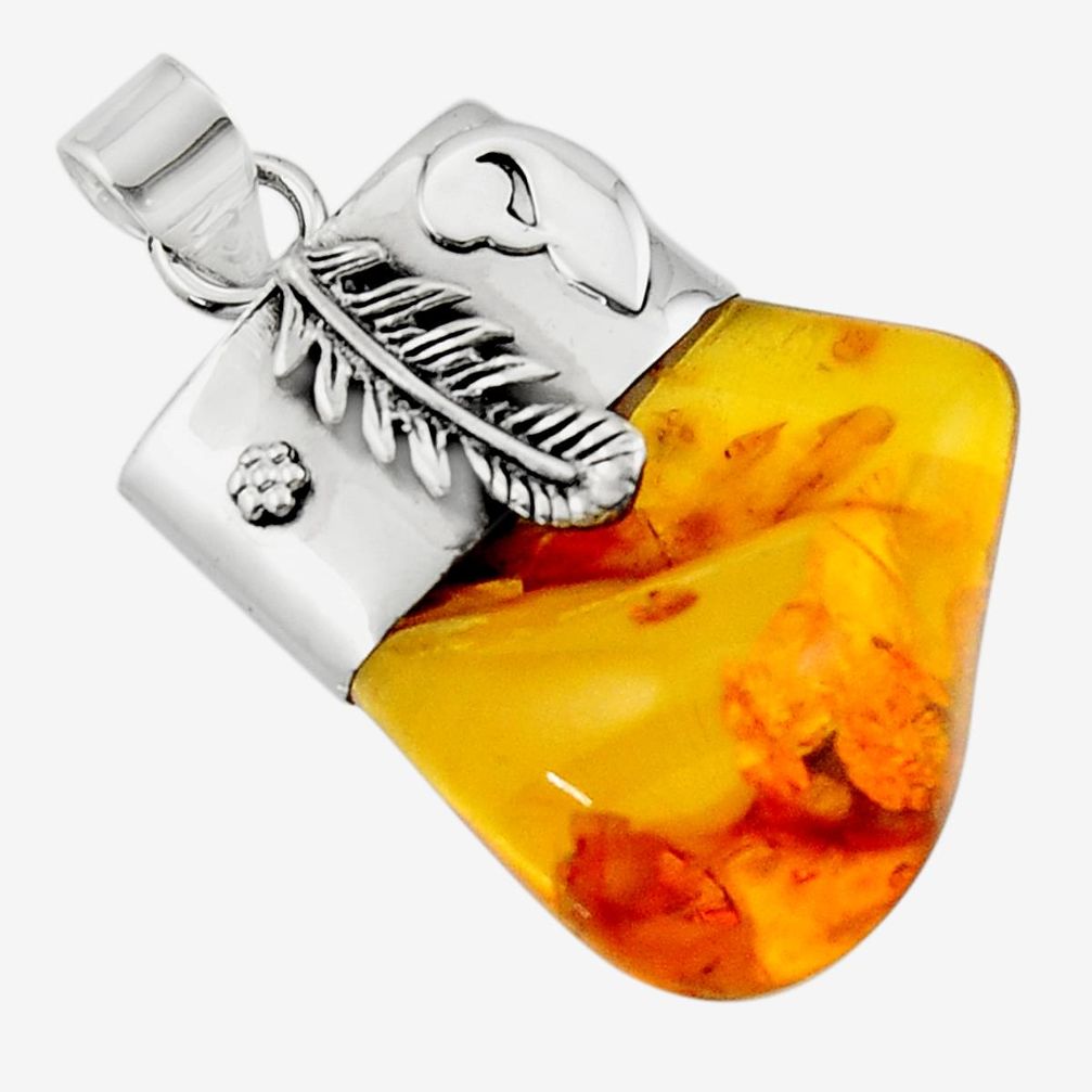 16.70cts natural orange baltic amber (poland) 925 silver feather pendant r51611
