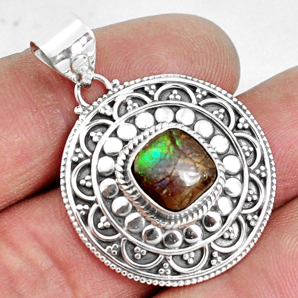 5.53cts natural multi color ammolite (canadian) 925 silver pendant p33422