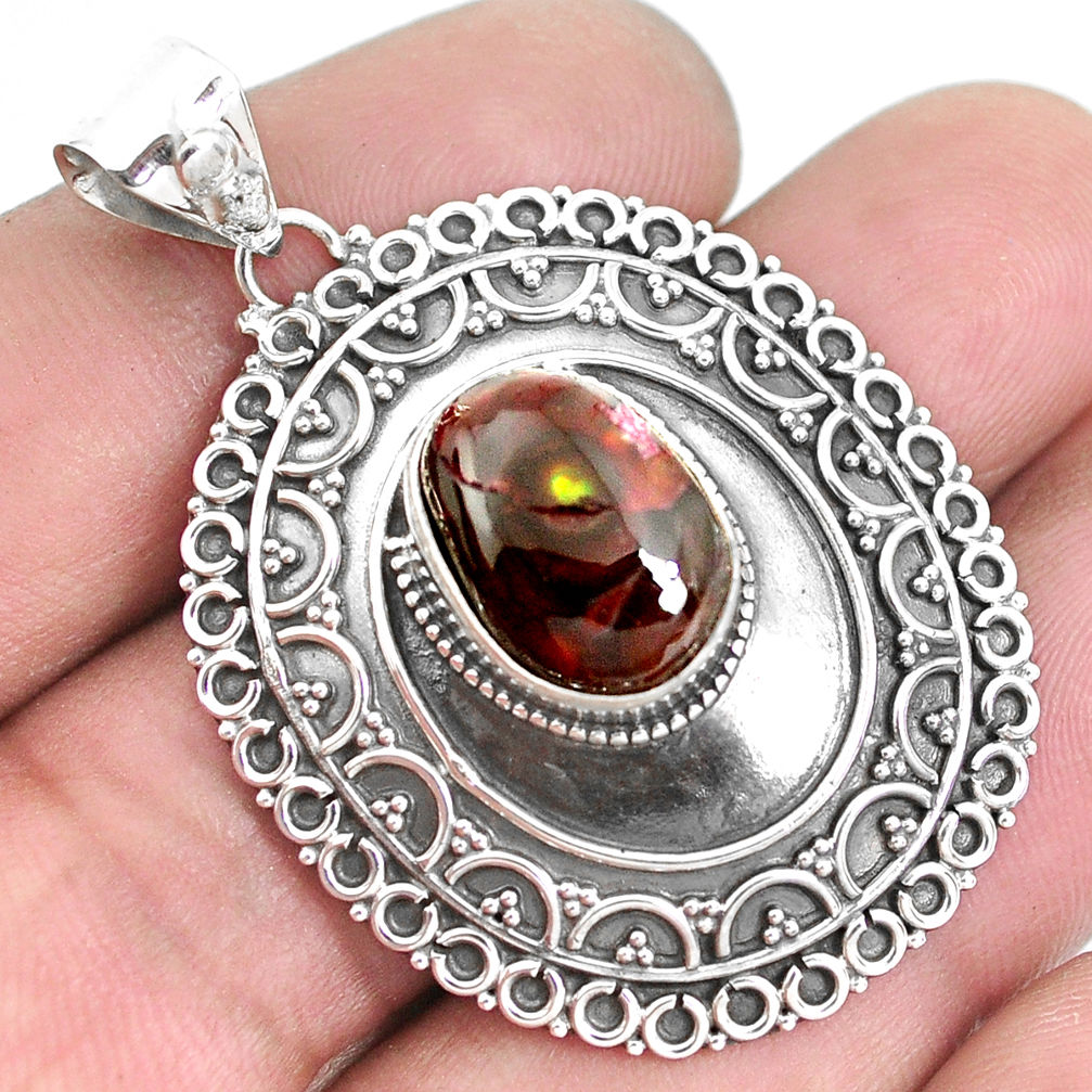 5.37cts natural multi color mexican fire agate oval 925 silver pendant p33453
