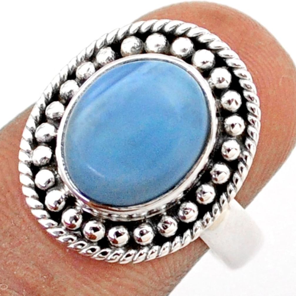 5.12cts solitaire natural blue owyhee opal oval 925 silver ring size 7 t80335