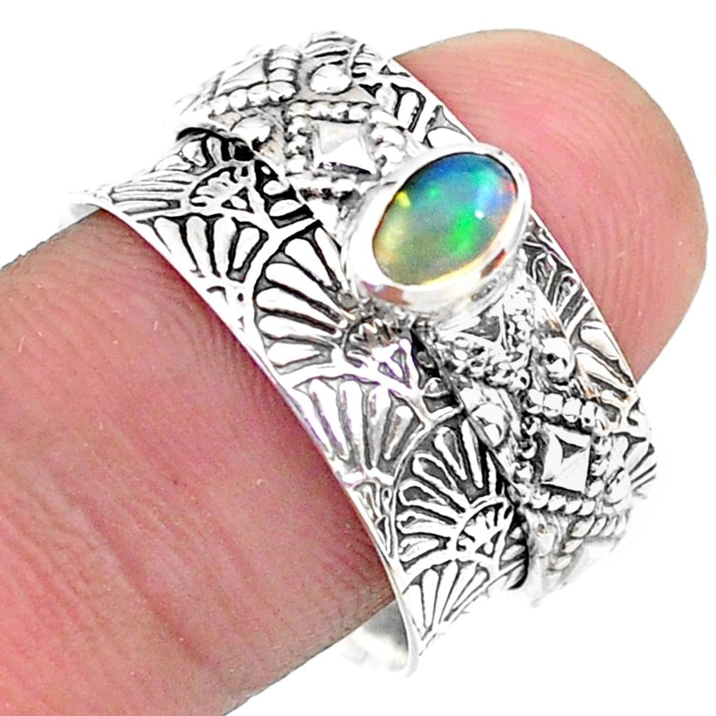 0.71cts solitaire natural ethiopian opal 925 silver spinner ring size 7.5 t31454