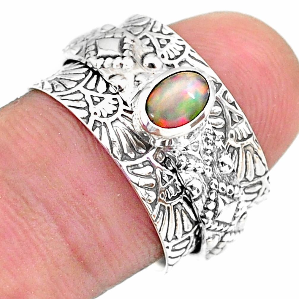 0.69cts solitaire natural ethiopian opal 925 silver spinner ring size 6.5 t31460