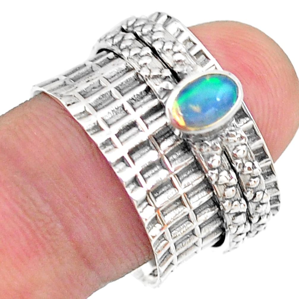 0.74cts solitaire natural ethiopian opal 925 silver spinner ring size 7.5 t31475