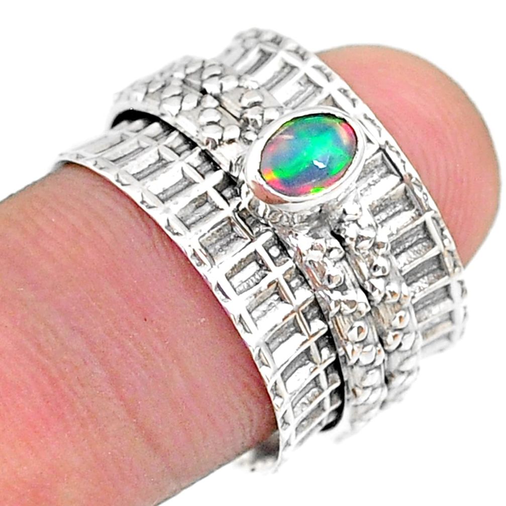 0.69cts solitaire natural ethiopian opal 925 silver spinner ring size 6.5 t31477