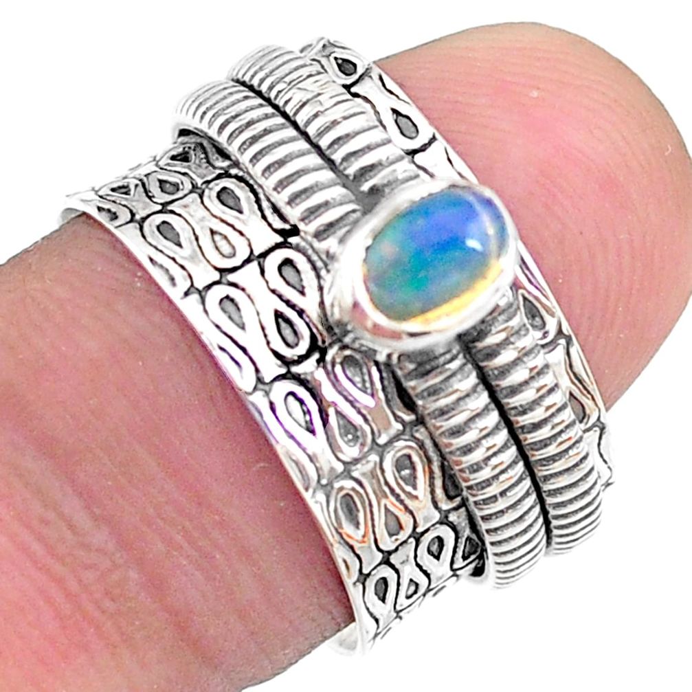 0.71cts solitaire natural ethiopian opal 925 silver spinner ring size 6.5 t31736