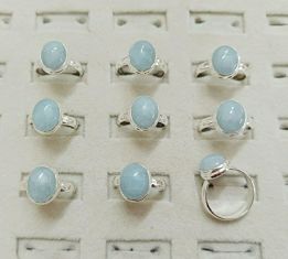 Wholesale lot of 9 Aquamarine Oval rings in 925 Sterling Silver. (Ring Sizes- 6,7,8,9)