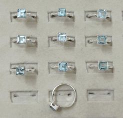 Wholesale lot of 10 Blue Topaz Square rings in 925 Sterling Silver. (Ring Sizes-7,8,9)