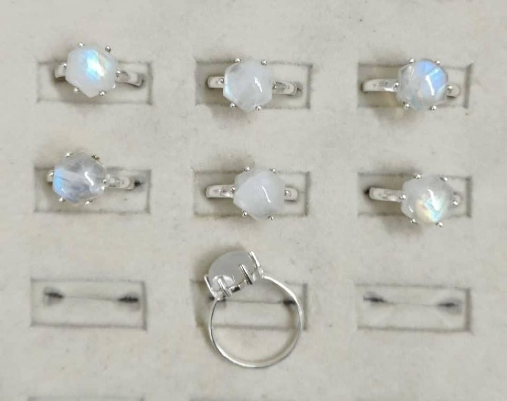 Wholesale lot of 7 Rainbow Moonstone round shaped rings in 925 Sterling Silver. (Ring Sizes-6,7,8,9)