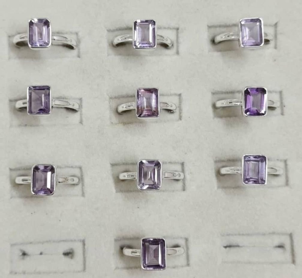 Wholesale lot of 10 Amethyst faceted Octagon shaped rings in 925 Sterling Silver. (Ring Sizes-7,8,9)