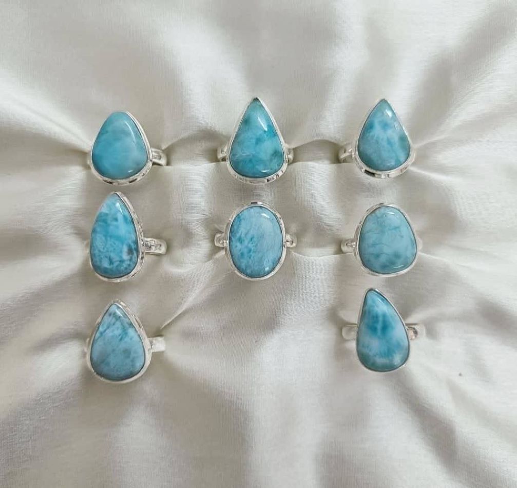 Wholesale lot of 8 Larimar Pear shaped rings in 925 Sterling Silver. (Ring Sizes- 7,8)