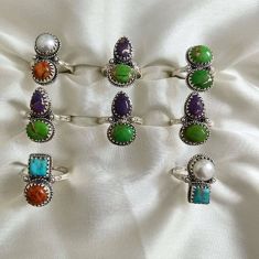 Wholesale lot of 8 Multicolor Copper Turquoise Southwestern rings in 925 Sterling Silver. (Ring Sizes-6-8)