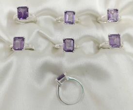 Wholesale lot of 7 Amethyst Octagon shaped rings in 925 Sterling Silver. (Ring Sizes-6,7)