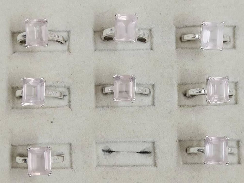 Wholesale lot of 8 Rose Quartz Octagon shaped rings in 925 Sterling Silver. (Ring Sizes-6,7)