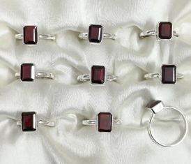 Wholesale lot of 9 Garnet Octagon shaped rings in 925 Sterling Silver. (Ring Sizes-7,8,9)