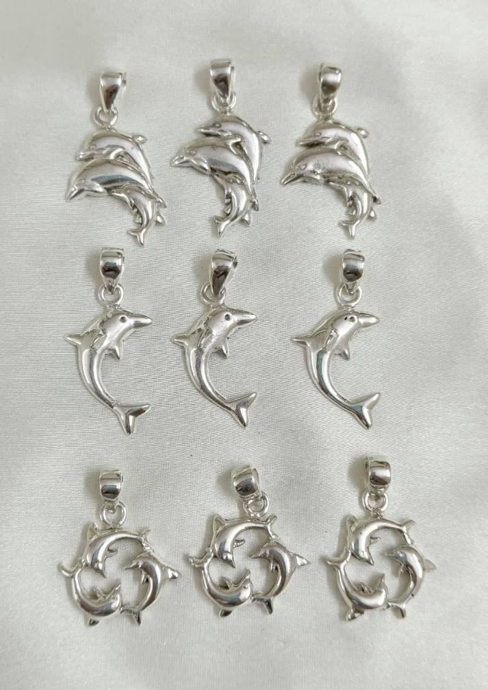 Wholesale lot of 9 Dolphin plain silver pendants in 925 Sterling Silver.