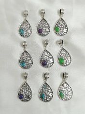 Wholesale lot of 9 Star and Moon Casting pendants in 925 Sterling Silver.