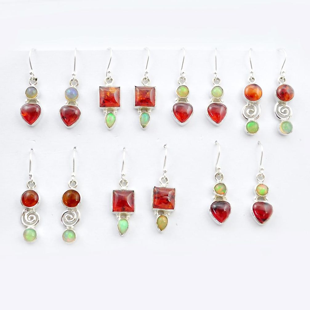 Wholesale lot of 7 natural orange baltic amber 925 silver dangle earrings