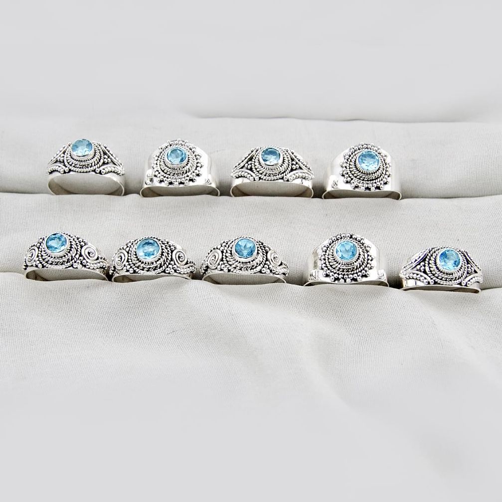 Wholesale lot of 9 natural blue topaz 925 silver ring (size 7 - 9) w3573