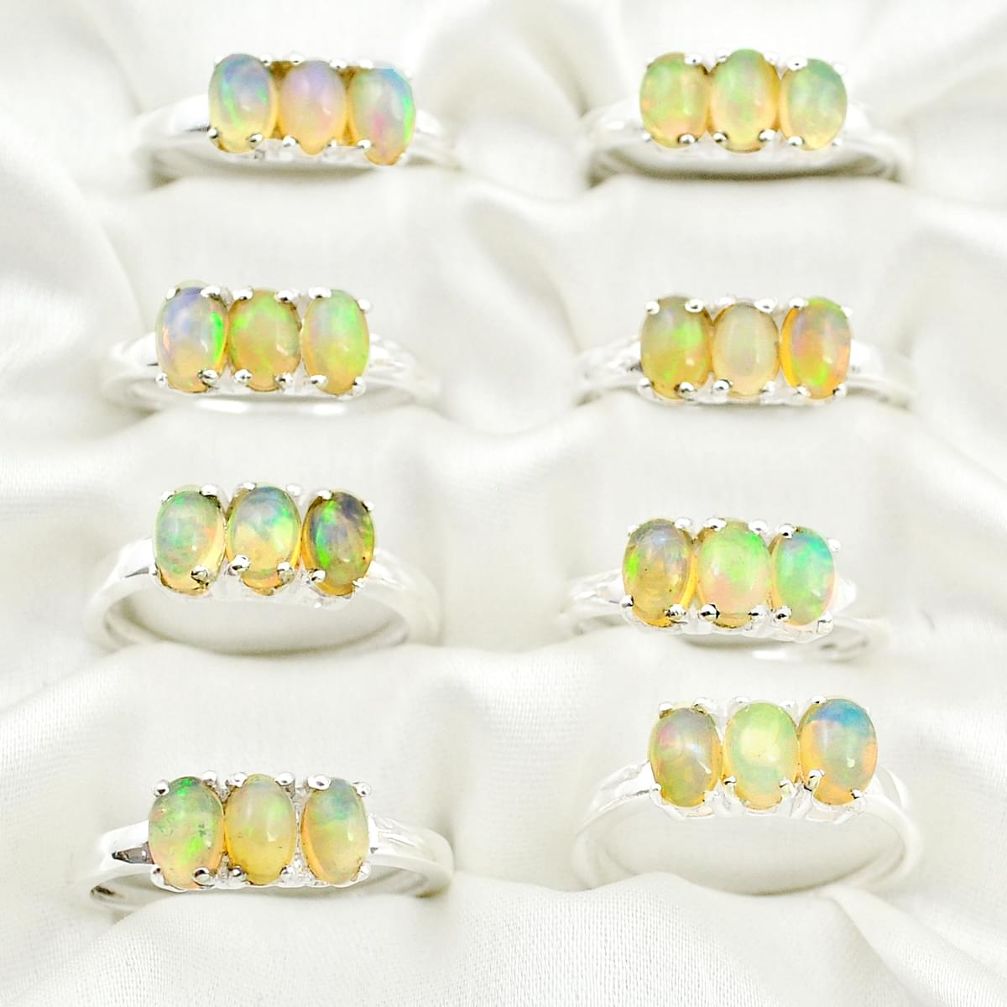 Wholesale lot of 8 natural ethiopian opal 925 silver infinity ring (size 7-9)