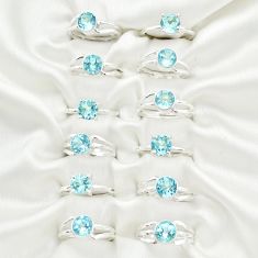wholesale lot of 12 natural blue topaz 925 silver ring (size 5-8)