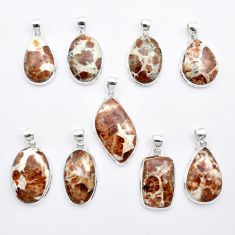 Wholesale lot of 9 natural brown garnet in limestone 925 silver pendant W514s